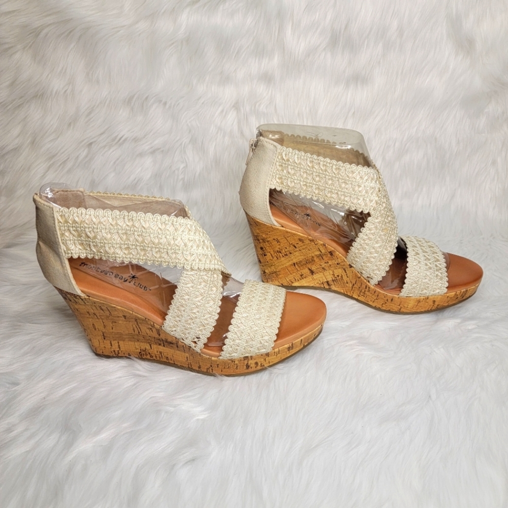 High wedges crossed strappy.